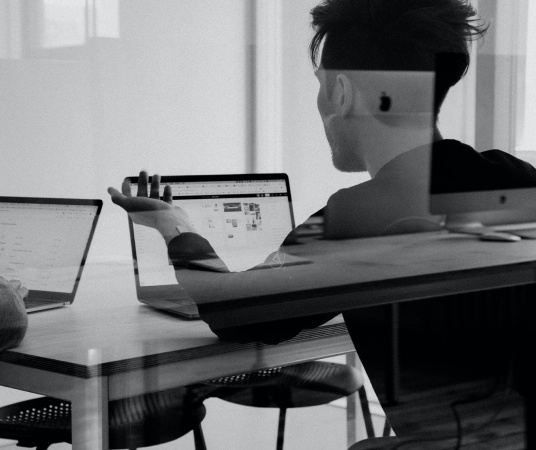Team at Adzbee Studio working on business solutions